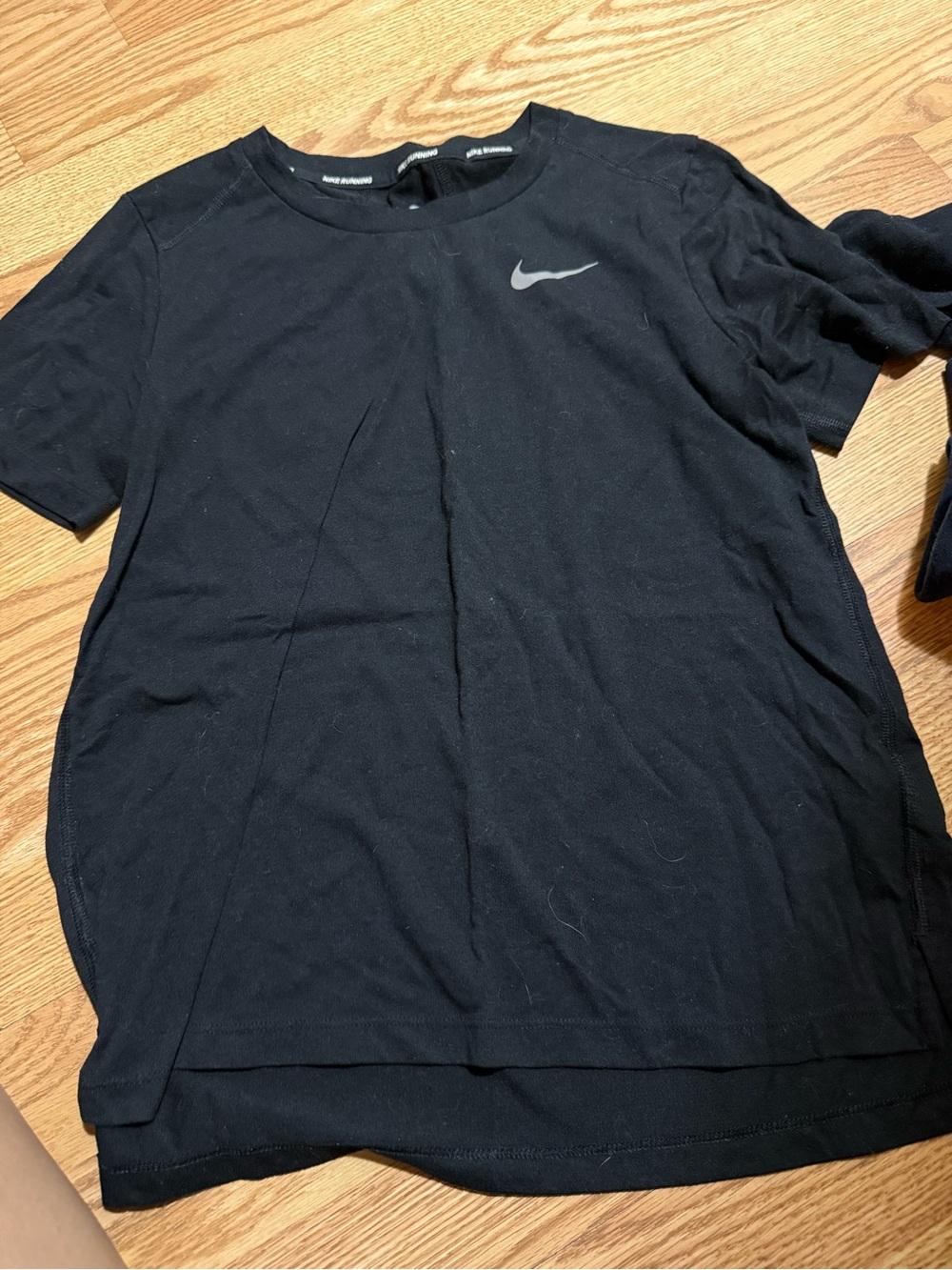 Nike Black Short-Sleeve Athletic Tee with Reflective Swoosh